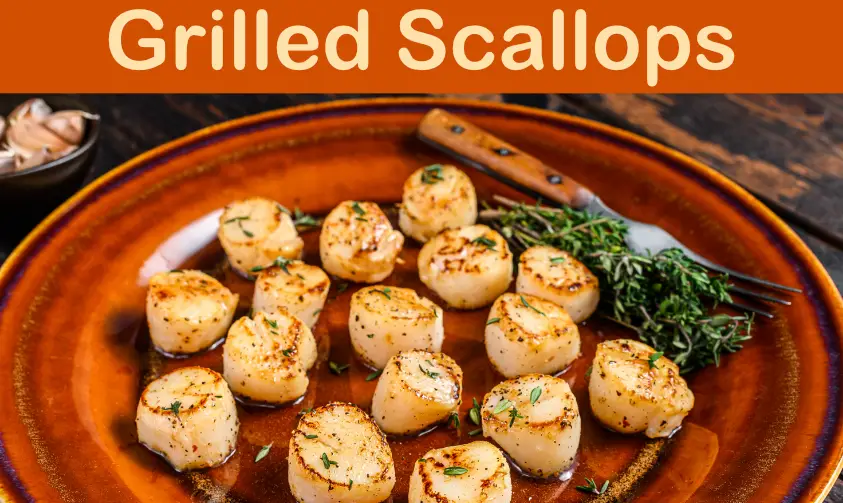 Grilled scallops on a wooden plate